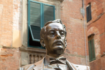 Head of statue of Giacomo Puccini in Lucca