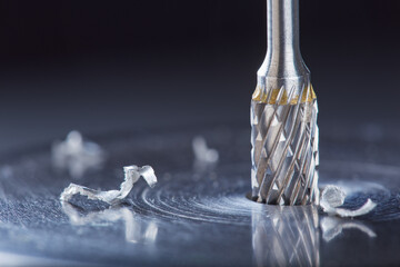 Milling cutter make sink in hole in steel billet. Locksmith work.