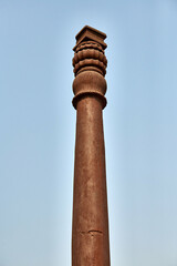 Iron pillar of Delhi structure part Qutb complex in South Delhi, India, rust resistant iron pillar...