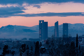 Fototapeta premium Towers of Madrid in the sunset