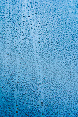 Fototapeta na wymiar close up of water droplets on window