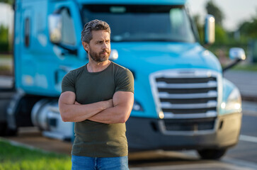 Fototapeta na wymiar man driver near lorry. Man owner truck driver near truck. man driver near lorry truck. Semi trucks vehicle. Trucking owner. hispanic man posing in front of lorry. Semi vehicle. truck stop