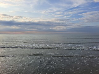 The French coast in summer, the coast with sunrise and sea waves.