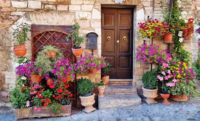 Foto op Canvas Traditional old villages of Italy, Umbria - beautiful Spello town. Charming floral streets decoration © Freesurf