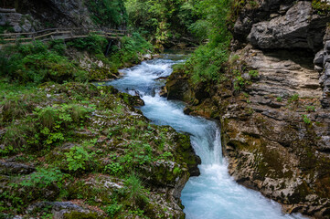 Vintgar gorge amazing cayon with river, rocks and nature, wooden foodpaths leads through wild natural reserve