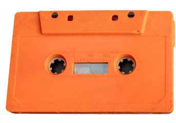 Orange cassette tapes, old and dirty. Isolated.
