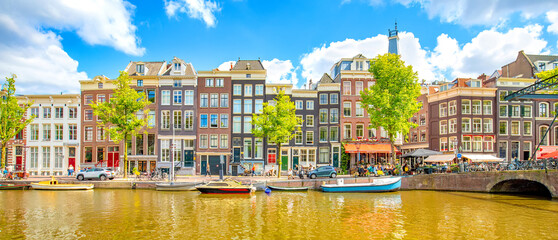 Panorama of Amsterdam city, scenic skyline over Amstel canal, Netherlands - obrazy, fototapety, plakaty
