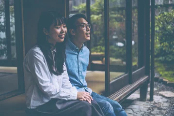 Foto auf Acrylglas Young japanese couple spending time in their house © oneinchpunch