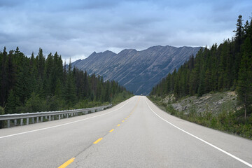 A road in the Canadian mountains. Banff National Park, Alberta, Canada.