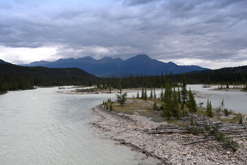 Landscape of Canada with river and Mountains. Jasper National Park, Alberta, Canada.