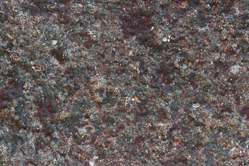Fragment of a stone wall close-up.