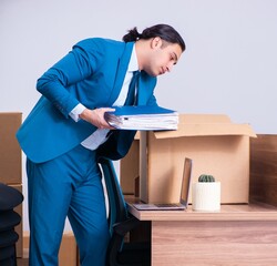 Obraz premium Young handsome businessman being fired from his work