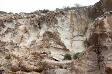 view of the cliff from below, old limestone rocks