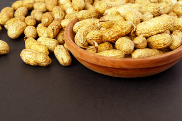 Roasted peanuts, peanuts in shell Isolated on black background