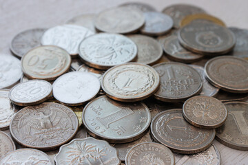 А bunch of coins of different denominations.