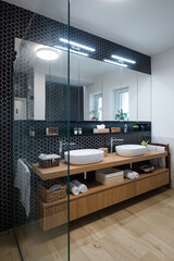 Cabinet with two wash basins in bathroom of modern house