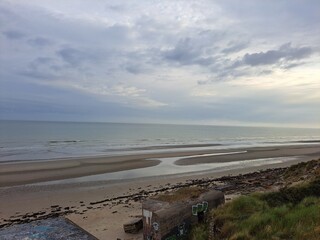 The French coast in summer, the coast with sunrise and sea waves.