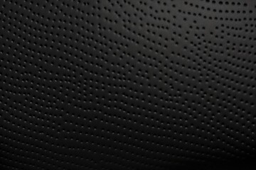 Sharp and Cool: Detailed Black Plastic Background Design with Unique Material Look