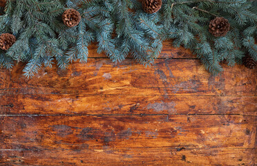 Christmas garland on a rustic wooden backdrop - 661176661