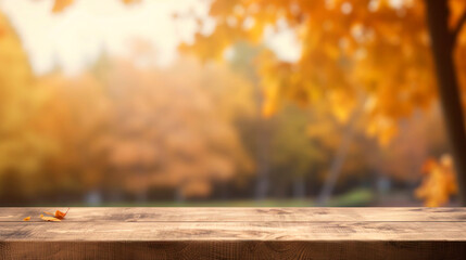 Naklejka na ściany i meble Empty wooden table top and blurred autumn landscape as background to display or mount your products
