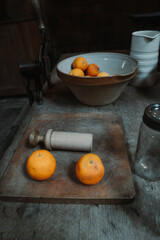 still life with oranges and tangerines in Victorian kitchen 