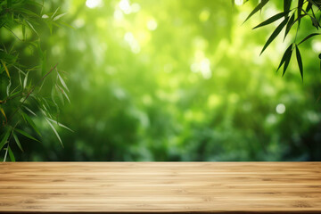 wooden table and green bamboo leaves in the background. place for text. layout for your advertisement