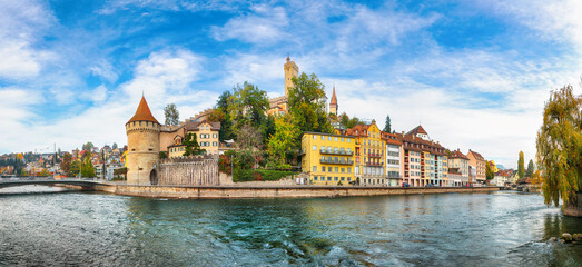 Outstanding historic city center of Lucerne with famous buildings and Nolliturm tower on Reuss...