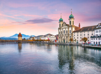Gorgeous historic city center of Lucerne with famous buildings, old wooden Chapel Bridge (Kapellbrucke) and Jesuitenkirche Church