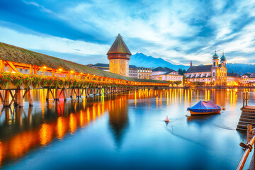 Marvelous historic city center of Lucerne with famous buildings and old wooden Chapel Bridge (Kapellbrucke)