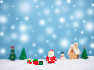 Santa claus in the town with shiny light for Christmas and New Year holidays background, Winter season, falling snow, Copy space for Christmas and New Year holidays greeting card.