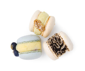 Delicious sweet macarons isolated on white, top view