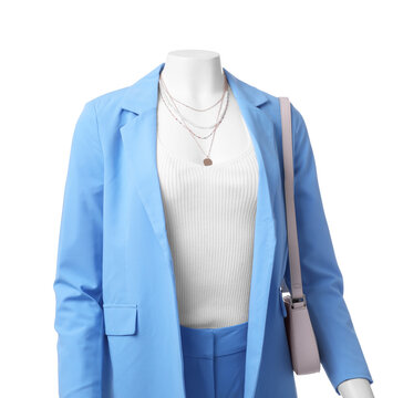 Female mannequin dressed in light blue suit and top with accessories isolated on white. Stylish outfit