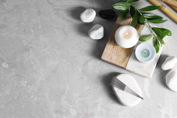 Flat lay composition with acupuncture needles on light grey marble table, space for text - obrazy, fototapety, plakaty