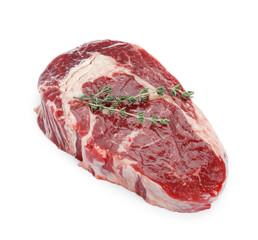 Piece of fresh beef meat and thyme isolated on white