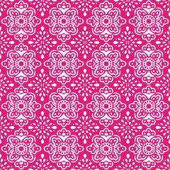 Ornamental floral seamless pattern. Geometrical boho allover print. Abstract flowers hand drawn on hot pink background. Diamond shaped lace backdrop