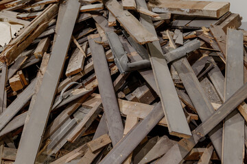 Pile and stack of old removal timber from construction site or building. 