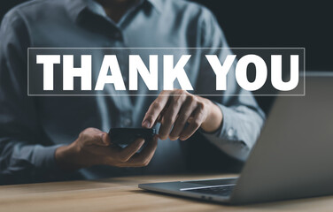 businessman using a phone and sending the message thank you on a display screen. concept of congratulations, appreciation, and gratitude, thank you business. presentation from technology digital