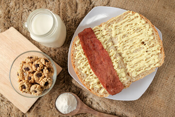 Bread with smoked beef on a plate for breakfast and coffee break