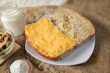 Bread with salted egg spread on a plate for healthy breakfast
