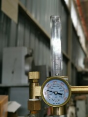 Close up image of liquid gas pressure meter.