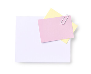 Sticky note with paper clip on white background
