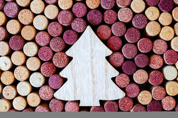 Wine corks with Christmas fir tree wooden toy as copy space, natural texture used bottle stoppers....