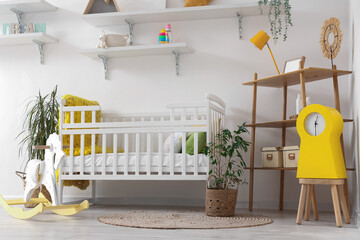 Stylish interior of children's room with baby bed and rocking horse - obrazy, fototapety, plakaty