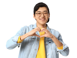 Young Asian man making heart gesture on white background
