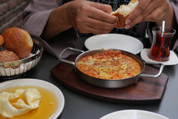 Turkish Menemen omelet in a frying pan. .
