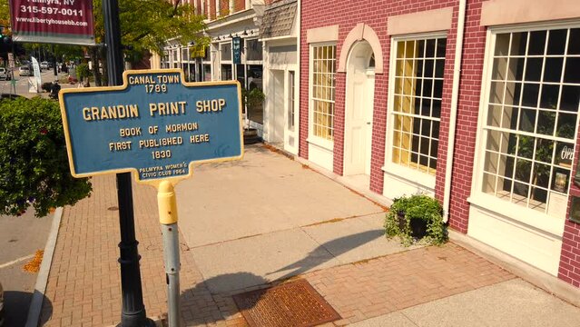 shot of  a landmark sign at EB Grandin Downtown Palmyra New York. Also the location of the first publication of the Book of Mormon.  Early church history.