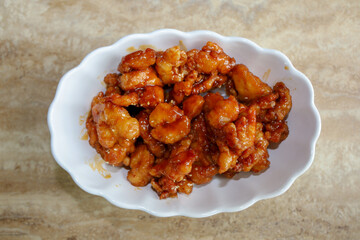 Top view of a delicious honey sesame chicken dish.