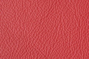 red natural leather closed up background