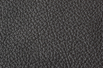 Black natural leather closed up background