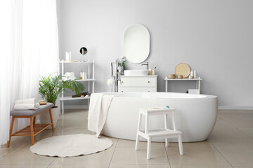 Interior of stylish modern bathroom with bathtub - obrazy, fototapety, plakaty